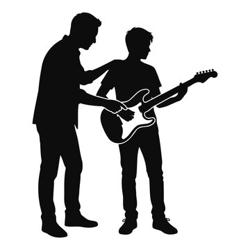 Silhouette of a man teaching a boy to play an electric guitar