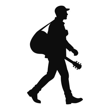 Silhouette of a man walking while carrying an acoustic guitar on his back