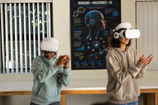 African American youths wearing hoodies and VR headsets interacting with AI poster at lab bench