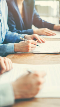 Corporate team analyzing project plan and budget