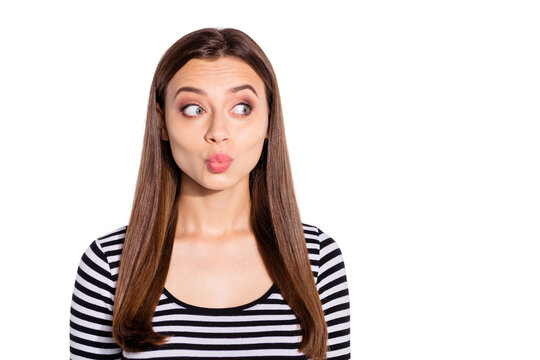 Portrait of cute person looking with her lips pouted plump wearing striped pullover isolated over white background