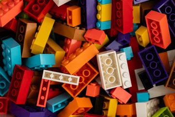 Fototapeta premium Colorful mix of plastic Lego building blocks and bricks background
