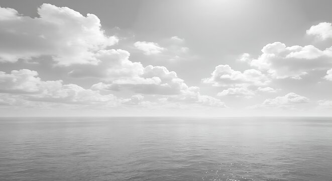 Minimalist monochrome seascape with calm ocean water and fluffy clouds in the sky, abstract background