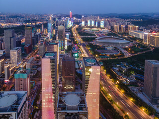 Naklejka premium Night Aerial View of Modern Urban Skyline with Skyscrapers