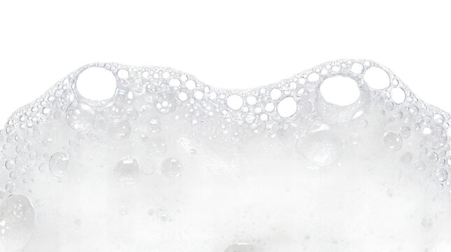 White foamy soap bubbles on transparent background, detergent foam texture macro, hygiene cleaning concept backdrop