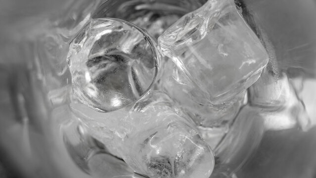 Macro view of fresh ice blocks in crystal glass