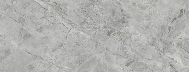 Light gray and beige marble texture with subtle pink veining and natural stone details. Elegant surface for ceramic tiles, interior walls, flooring, and architectural design. © Vidal