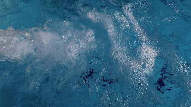 Swimming Pool Water Bubbles and Ripples from Return Outlet