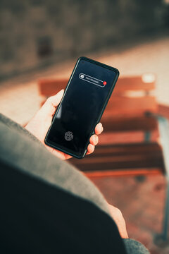 Mature woman receiving new message notification on smartphone. Texting, mobile technology use among older adults, and staying connected through smartphones concepts.