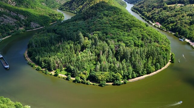 Cargo Ship Navigating the Saar Loop (Saarschleife) in Saarland, Germany