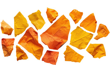 Naklejka premium Scattered orange and yellow torn paper fragments