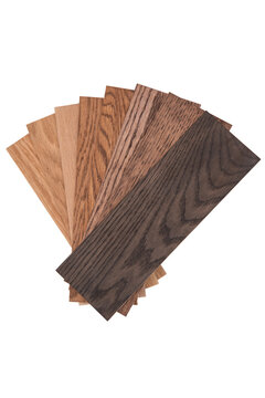 Fan-shaped wood color swatches and veneer samples isolated on white background.