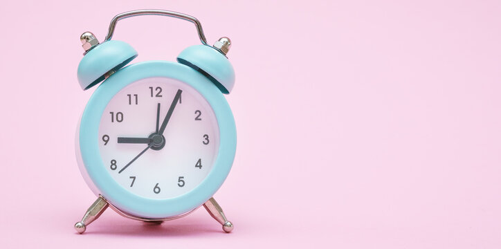 Wide Banner with Mint Alarm Clock on Pink
