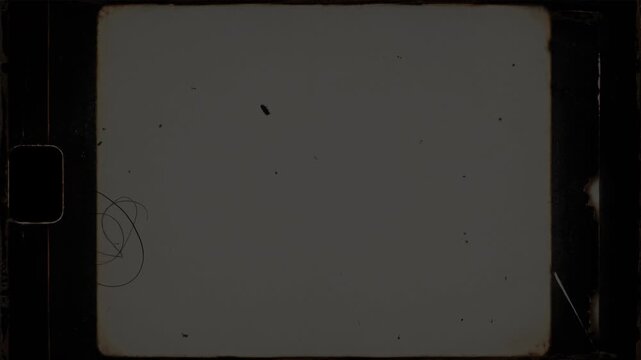 Old film frame overlay with scratches and dust. Perfect for retro video effects, nostalgic flashbacks, cinematic transitions, and adding an authentic old analog movie aesthetic to modern footage.