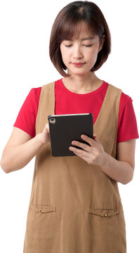 Happy young asian woman using digital tablet isolated transparency background wearing red shirt apron work standing