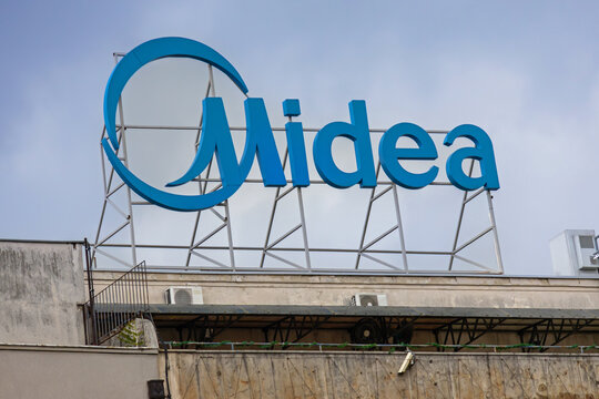 Famous technology brand Midea logo on top of tall building in Belgrade capital of Serbia