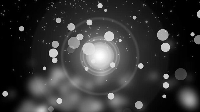 Central glowing light with concentric rings background animation, bokeh circles and scattered small particles background