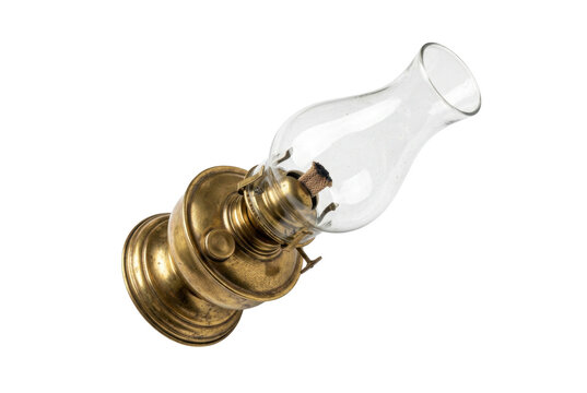 Antique brass oil lamp with glass chimney.