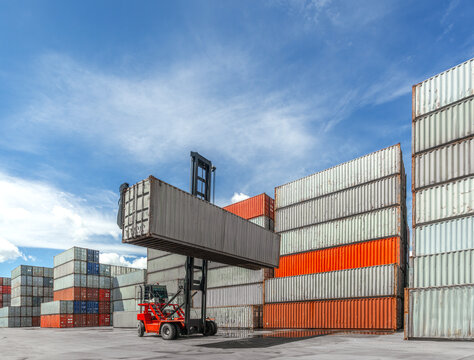 Containers are lifted by forklift into the port