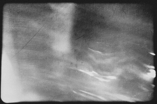 light leak overlay effect with scratch dust and blur light leaks,retro noisy film texture light leak flare on black background,abstract black and white background with red bokeh,grunge film strip