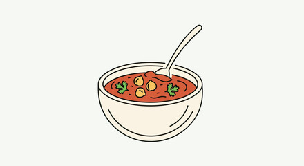 Stylized bowl of hearty chickpea curry with a spoon