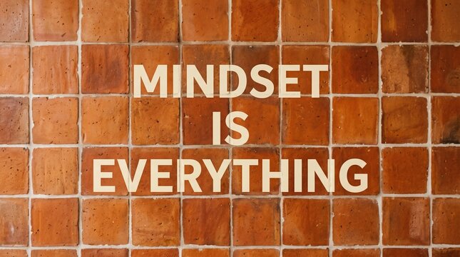 Mindset is everything text on a rustic terracotta tile wall background