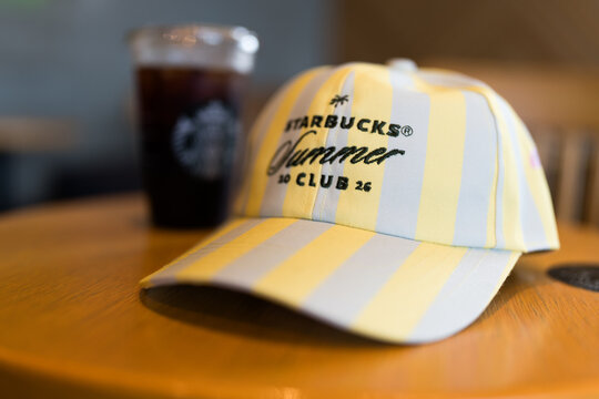 Bangkok, Thailand - July 30, 2026 : Starbucks Summer Cap limited edition promotional paired totaling 550 Baht or more per receipt.