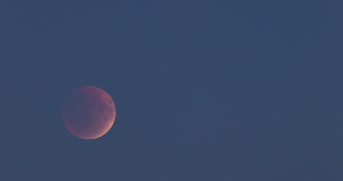 Real Total Lunar Eclipse on Dark Blue Sky, Telephoto Timelapse Static Shot, No People