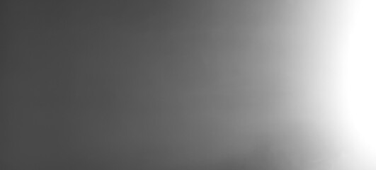 Fototapeta premium Abstract graphite gradient background with soft light effect