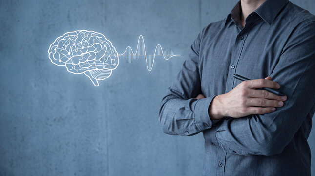 Business professional analyzing data on mental health. Modern workplace with innovative technology and focused executive.