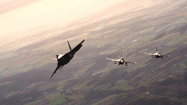 F-22 Raptor Leads Twin F-16 Fighters Across Skies Demonstrating Superior Air Dominance and Tactical Precision Excellence.