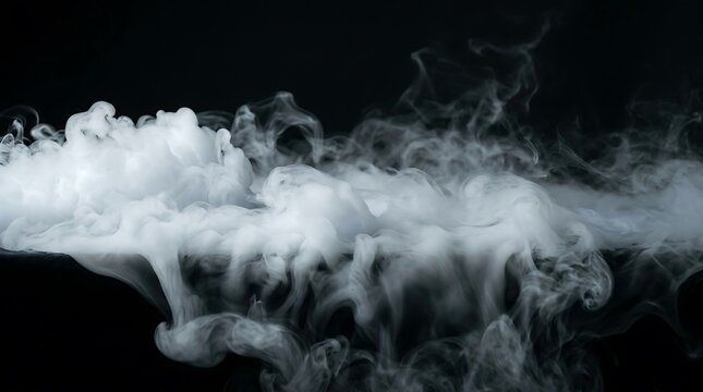 A thick cloud of white dry ice fog rolling across a dark surface creating a mysterious and atmospheric visual effect