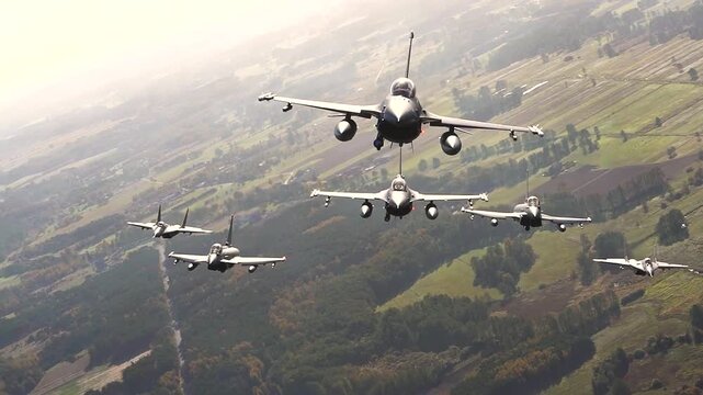 Fighter Jet Squadron Flies in Perfect Formation Showcasing Tactical Coordination, Air Superiority, and Combat Readiness Together.