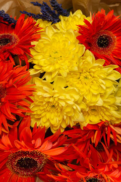 Autumn bouquet with orange and yallow flowers.