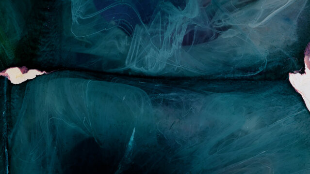 Creating art with alcohol ink and epoxy resin in a studio space