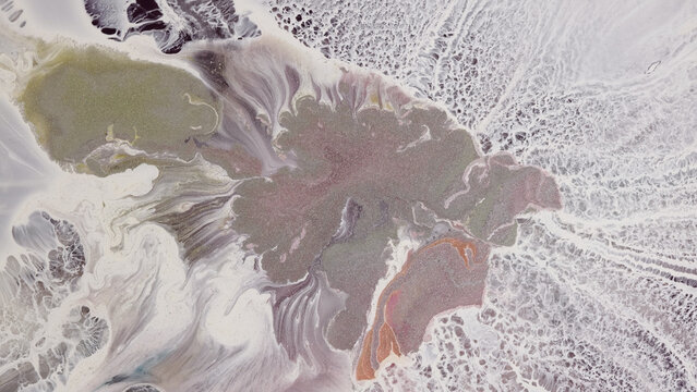 Colorful alcohol ink design on surface with epoxy resin applied