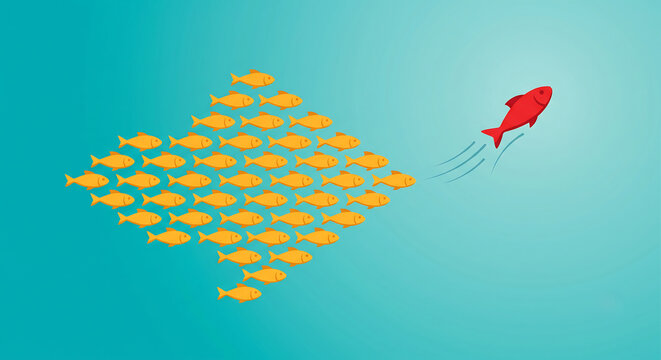 Red fish leading a school of yellow fish forming an arrow shape representing leadership, business strategy, teamwork, direction, and standout concept