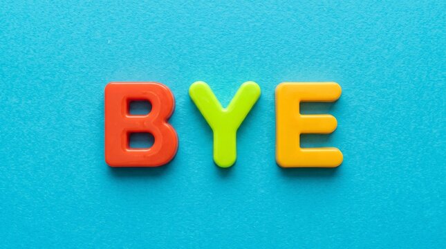 Colorful plastic toy letters spelling out the word "BYE" on a bright blue background. A fun, vibrant farewell message.