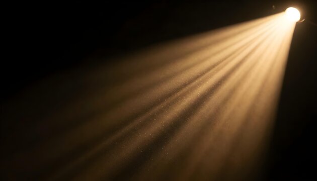 Golden spotlight beams illuminate dust particles in the dark atmosphere