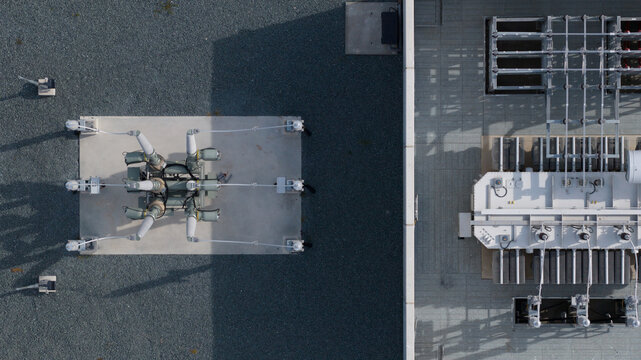 Aerial view of High Voltage Electrical Substation Surrounded by Farmland