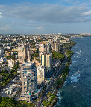 Aerial view of the Santo Domingo Malecon and George Washington Avenue, featuring modern high-rise buildings along the Caribbean Sea in Santo Domingo, Distrito Nacional, Dominican Republic.