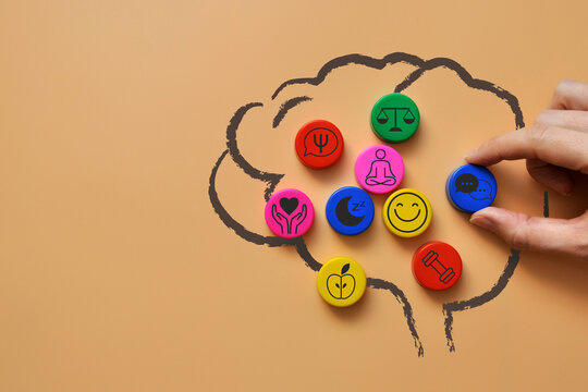 Brain With Mental Health Icons Representing Emotional Wellbeing