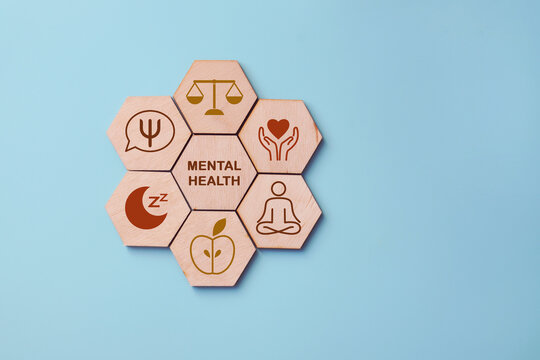 Wooden Mental Health Symbols Representing Emotional Wellbeing and Self Care