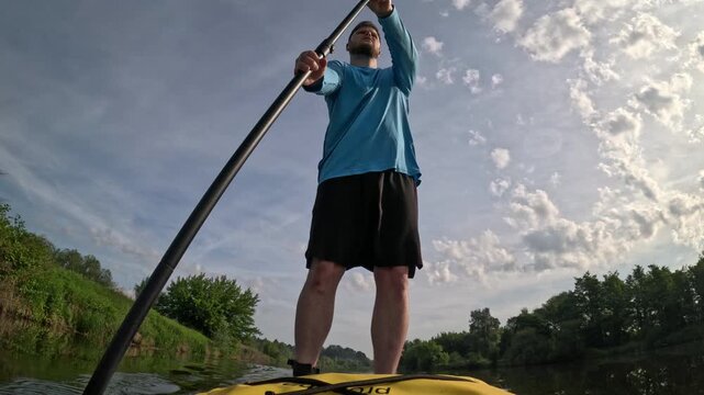 Man paddling SUP on Miedzybrodzkie Lake