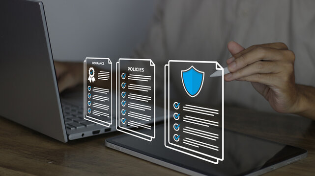 Review digital insurance policy documents on laptop and tablet with stylus, featuring insurance badge, policies checklist, and shield icons for data security, compliance, and risk management
