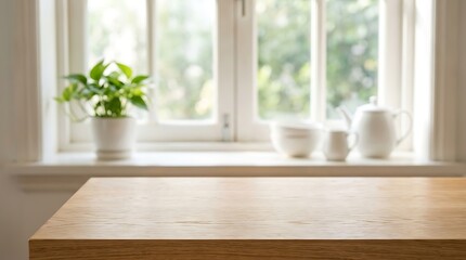 Fototapeta premium Light wooden window sill with potted plant near large windows