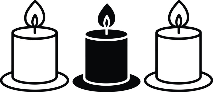 Three lit candles on round bases in a row