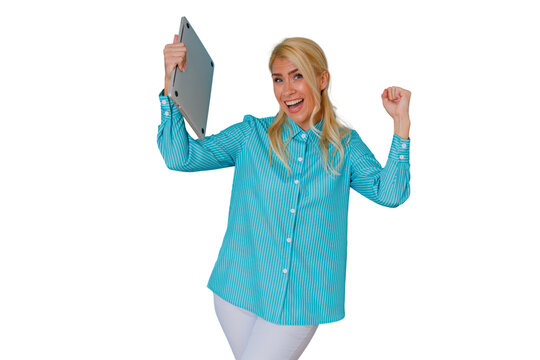 Businesswoman celebrating success and victory holding a laptop, expressing joy and achievement with a fist pump