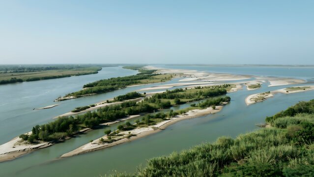 Serene River Landscape With Green Islands And Curving Waterways