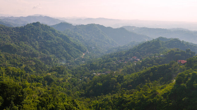 Aerial view of the lush green mountains and dense forests of Busay in the highlands of Cebu City, Central Visayas, Philippines.